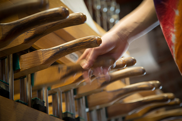 hands playing chimes